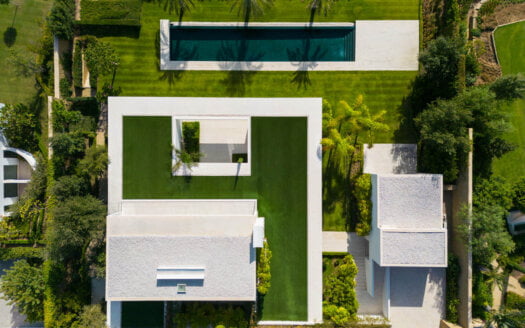 Frontline Golf Villa with Lush Garden