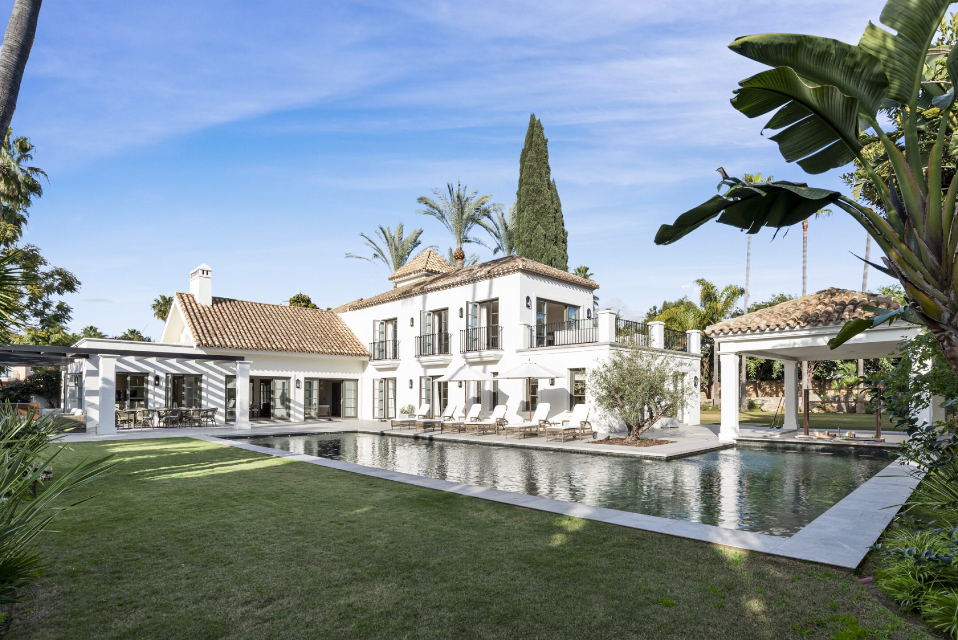 Maison Dorée villa in Nueva Andalucía, Marbella — pool and garden